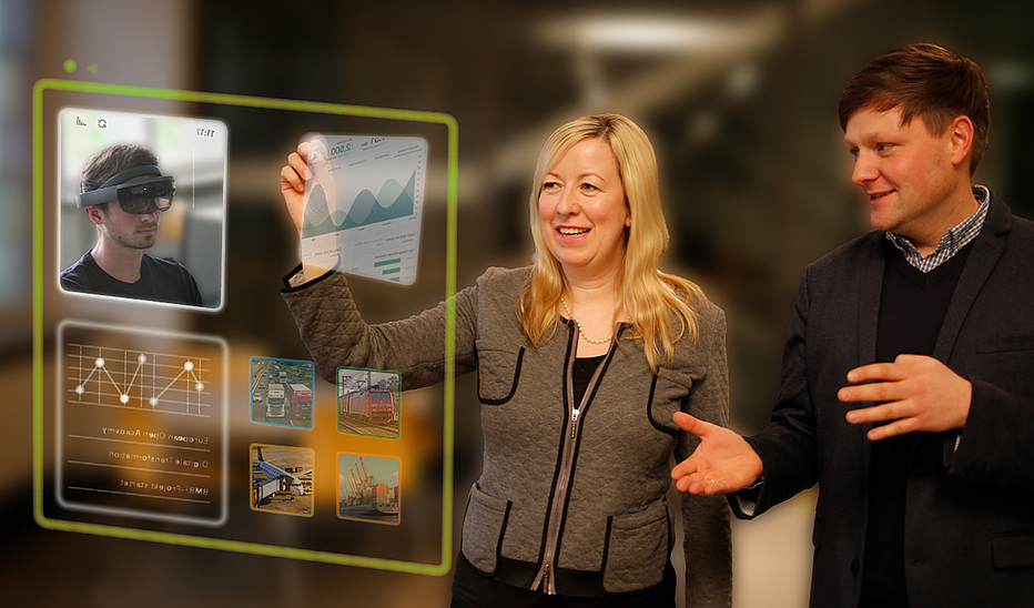 Professor Keil and Mr. Daniel Winkler interacting with a hologram on the topic of digital university teaching.
