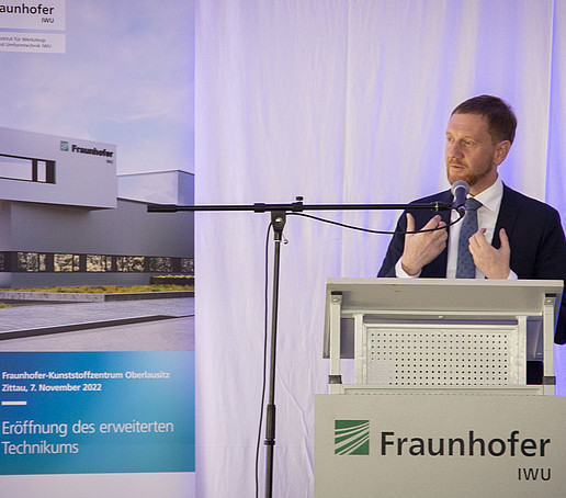 Saxony's Minister President Michael Kretschmer at the lectern