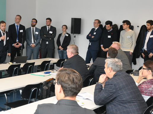 KOMPOST doctoral students presenting their research topics.
