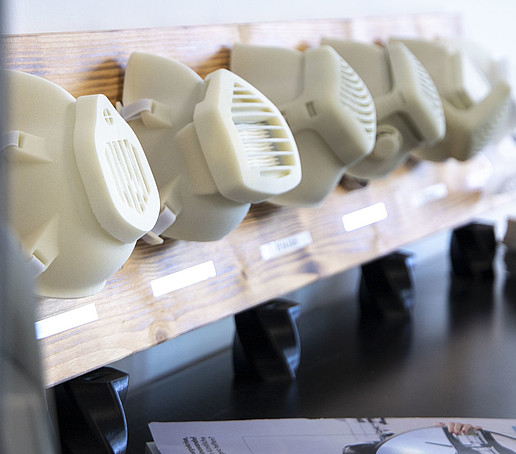 An exhibit consisting of various plastic masks