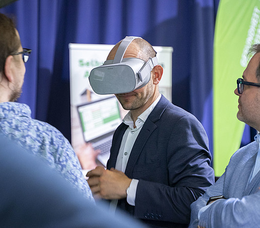 District Administrator with VR glasses.
