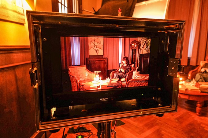 View of a screen with an illuminated movie set