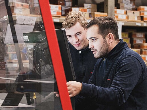 Two KIA students at a test facility