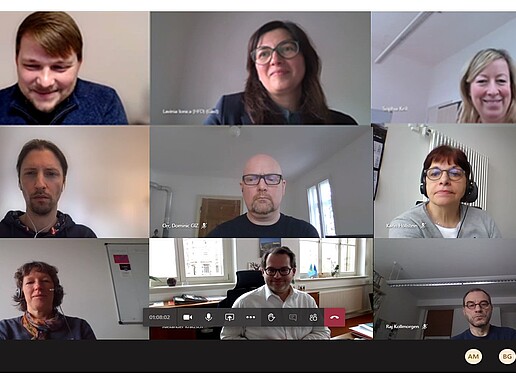 Nine people in an online conference on the topic of digital universities.