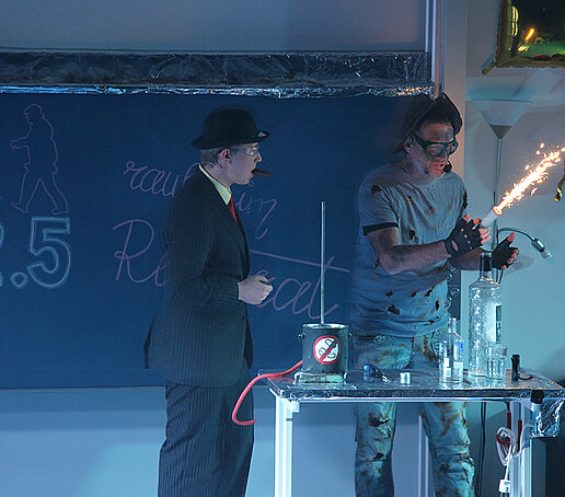 Performers experiment on stage.