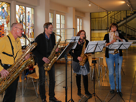 A saxophone quartet filled the corridors of the university with Christmas tunes and delighted the audience
