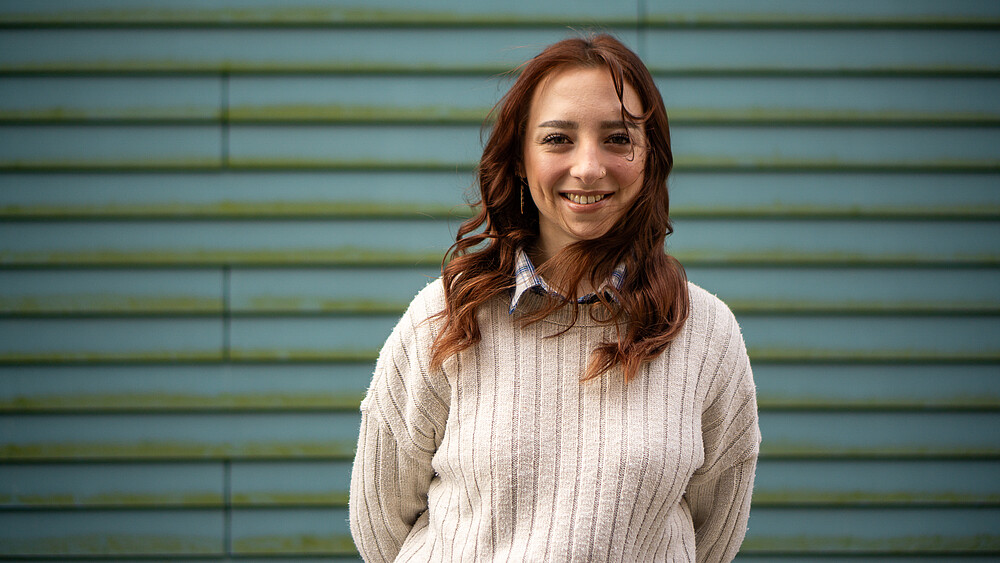 Aileen Baumgartner smiles into the camera.