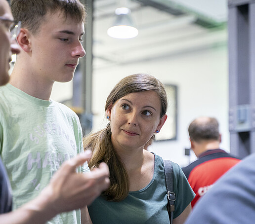 Visitors in conversation.