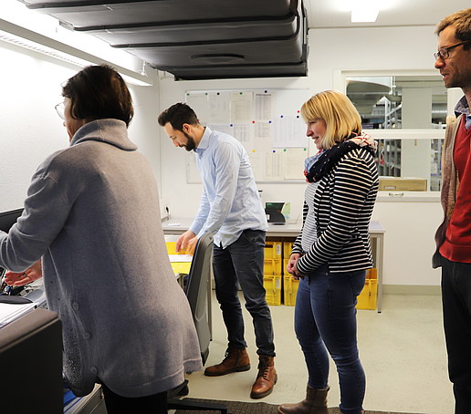 Scanning invoices in the mailroom (from left to right: Uta Jahnich, Marcel Fränzel, Kerstin Korb, Jan Bensch)