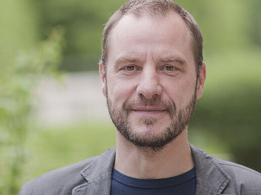 Prof. Kollmorgen smiles into the camera.
