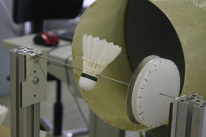 A shuttlecock is stretched in front of a test facility.