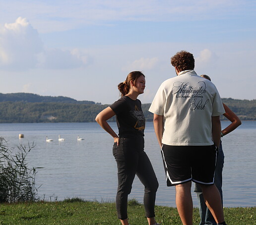 People on the shore of Lake Olbersdorf