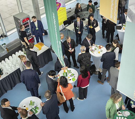 Bird's eye view of the networking during the coffee break in the foyer with various discussion groups.
