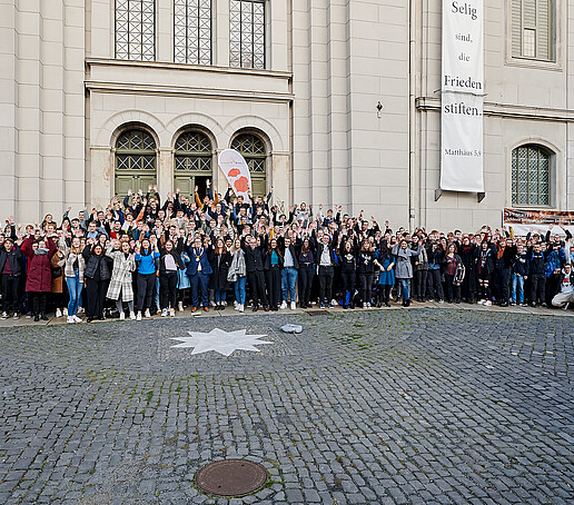 Group picture in front of building