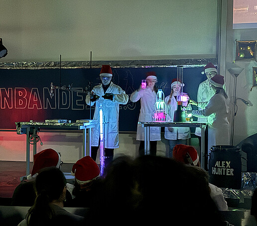 Performers experiment on stage.