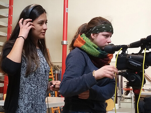 Students shoot a video podcast project in the university's laboratories