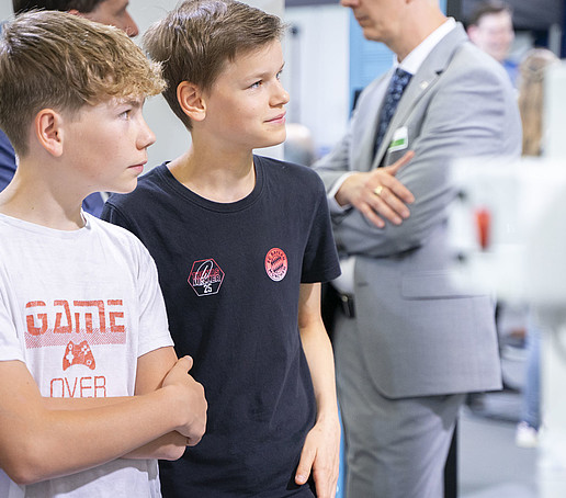Pupils look around the stand.