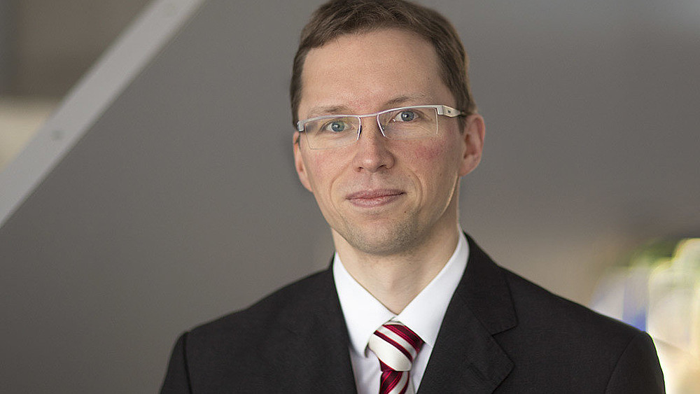 Professor Kornhuber smiles into the camera.