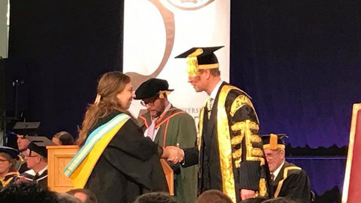 Prince Edward of Great Britain congratulates former HSZG student Brit Knop on her successful Master's degree