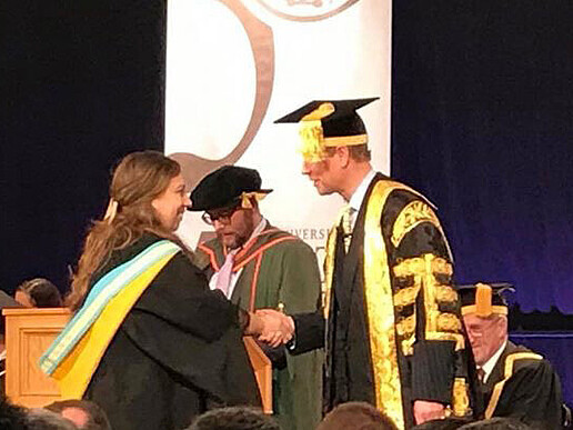 Prince Edward of Great Britain congratulates former HSZG student Brit Knop on her successful Master's degree