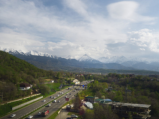 A Kazakh highway. The Kazakh mountains can be seen in the background.