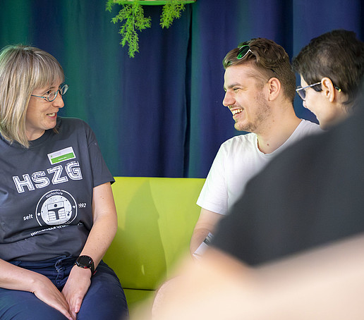 Visitors can find out about the teaching degree program on the sofa.
