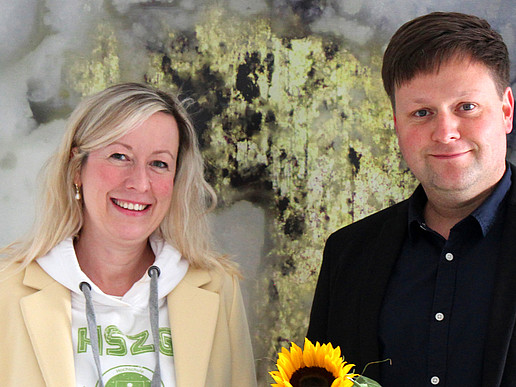Professor Sophia Keil and Daniel Winkler smile into the camera.