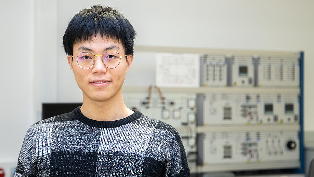 Chinese student Xue Fan looks into the camera with a smile.