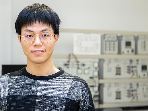 Chinese student Xue Fan looks into the camera with a smile.