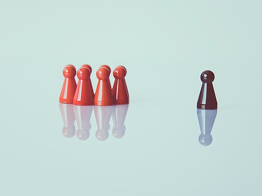 Group of playing pieces, with one offside