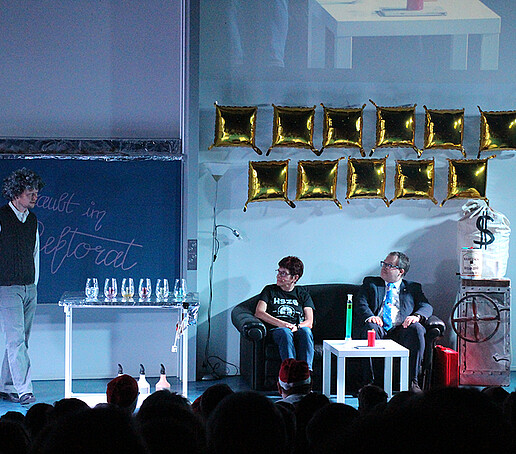 Mrs. Hollstein and the principal are talking to an actor.