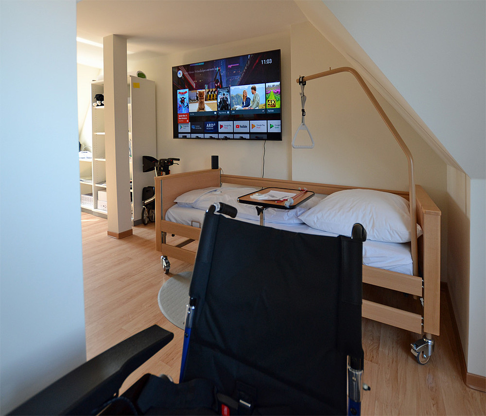 Laboratory with wheelchair and care bed