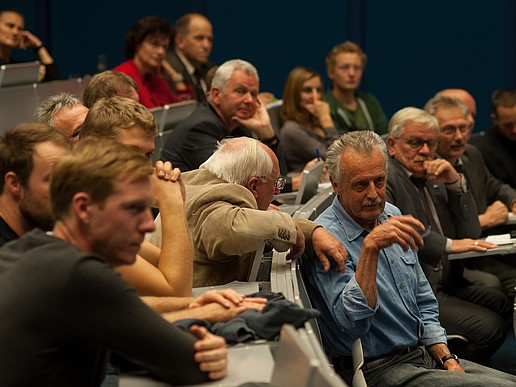The participants discuss passionately.