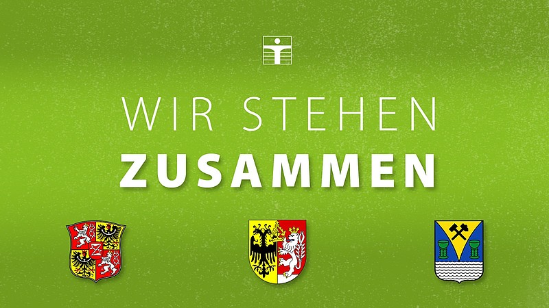 Grafik mit Wappen der Städte Zittau, Görlitz und Weißwasser sowie Logo der HSZG und Schriftzug "Wir stehen zusammen"