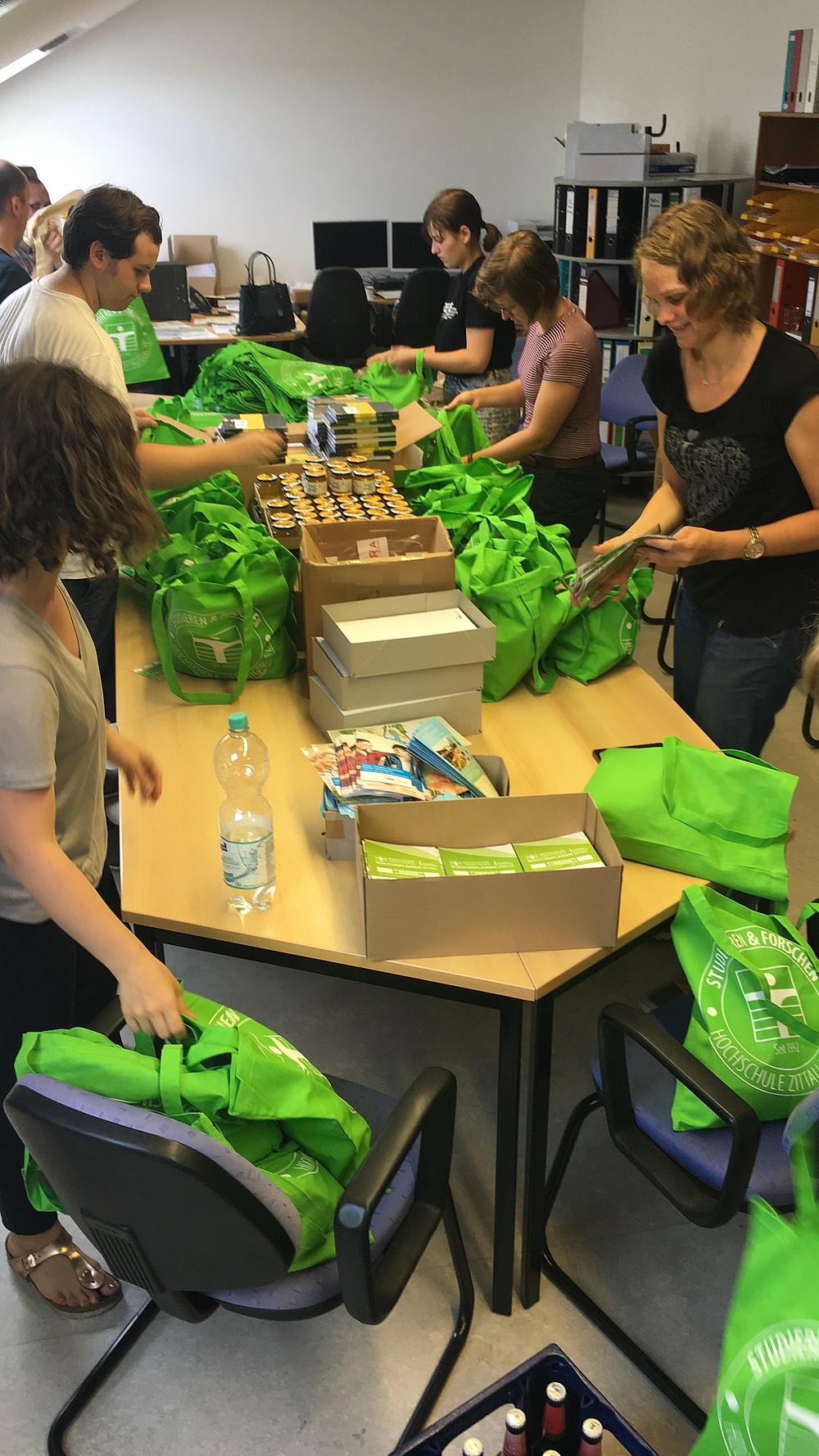 Packing bags in the Stura office