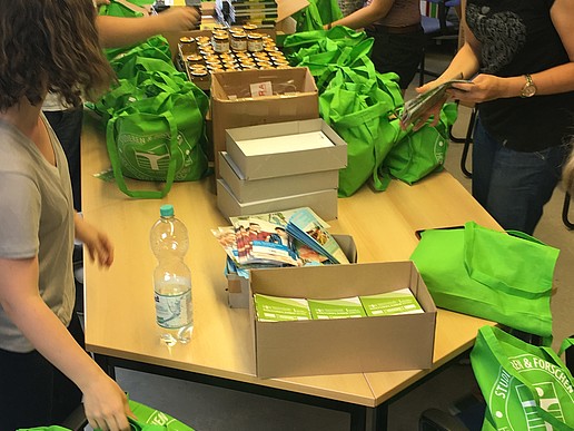 Packing bags in the Stura office