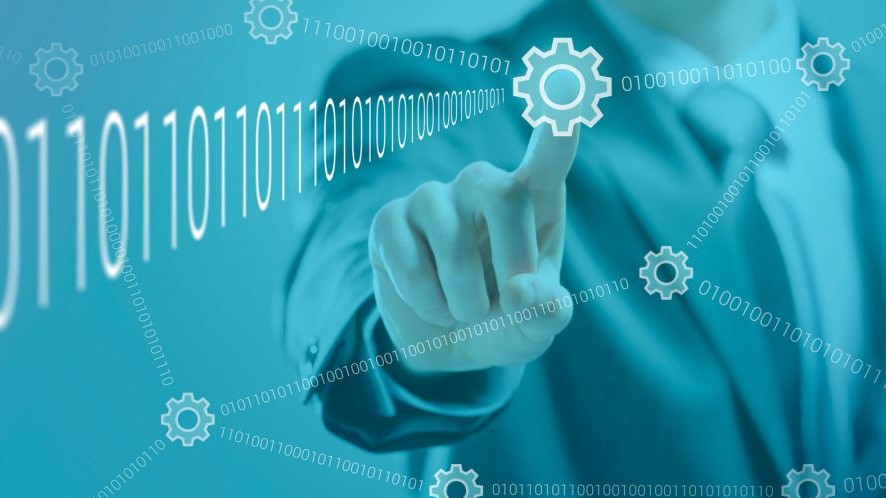 Man behind hologram. Man points to one of many cogwheels connected by lines of ones and zeros.